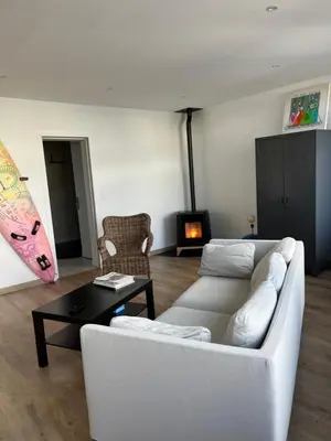 Coin salon dans l'établissement Hébergement retour de plage