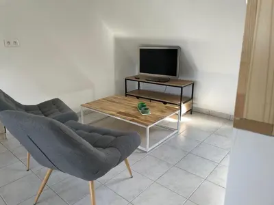 Télévision ou salle de divertissement dans l'établissement Petit loft