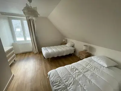 Un ou plusieurs lits dans un hébergement de l'établissement Nouveau, maison bord de mer Beg-meil