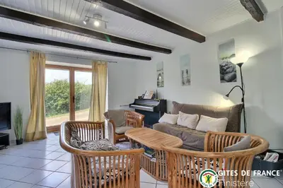 Coin salon dans l'établissement Ferme du Kastel Dinn