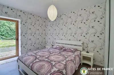 Un ou plusieurs lits dans un hébergement de l'établissement Ferme du Kastel Dinn