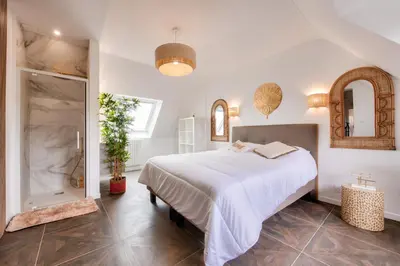 Un ou plusieurs lits dans un hébergement de l'établissement Vue mer - Maison pour 8 - Grand jardin