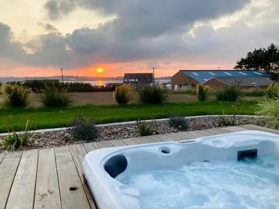 Lever ou coucher de soleil vu de la maison de vacances ou à proximité