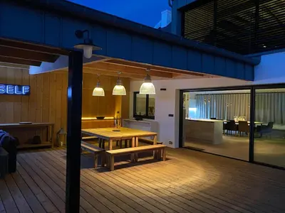 Coin salon dans l'établissement Villa le 25 - Piscine et Sauna au bourg de Carantec