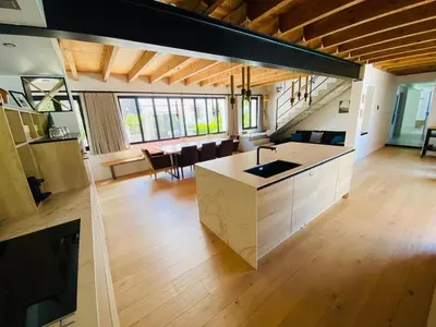 Coin salon dans l'établissement Villa le 25 - Piscine et Sauna au bourg de Carantec