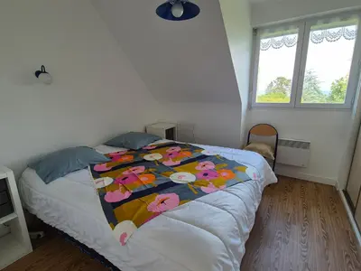 Un ou plusieurs lits dans un hébergement de l'établissement Maison familiale Morgat, jardin clos