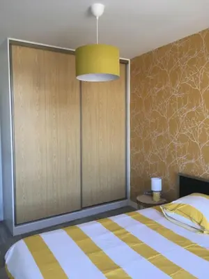Un ou plusieurs lits dans un hébergement de l'établissement Vue mer en plein cœur de Morgat