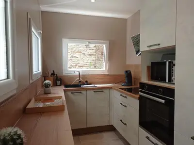 Cuisine ou kitchenette dans l'établissement Appartement T2 NEUF CENTRE VILLE