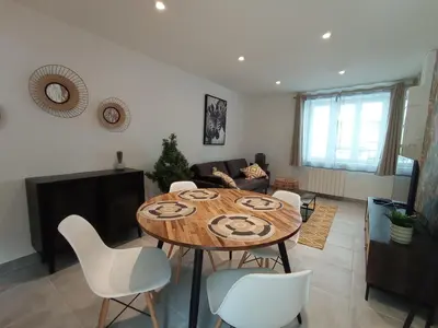 Coin salon dans l'établissement Appartement T2 NEUF CENTRE VILLE