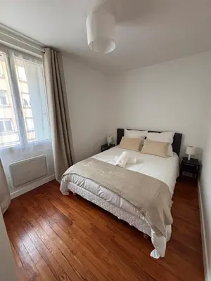 Un ou plusieurs lits dans un hébergement de l'établissement Charmant T3 Vue Mer & Confort en Plein Centre