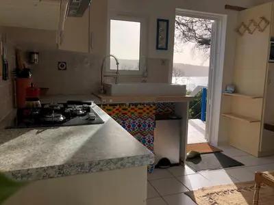 Cuisine ou kitchenette dans l'établissement An Koad - Cabane au bord de l'eau