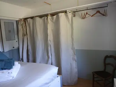 Un ou plusieurs lits dans un hébergement de l'établissement An Koad - Cabane au bord de l'eau