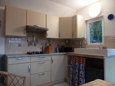 Cuisine ou kitchenette dans l'établissement An Koad - Cabane au bord de l'eau