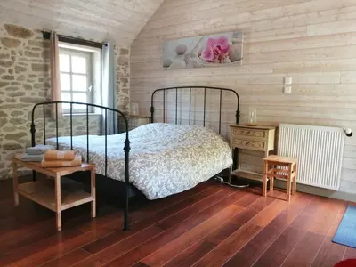 Un ou plusieurs lits dans un hébergement de l'établissement Gîte du Moulin de Brendouez