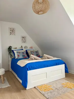 Un ou plusieurs lits dans un hébergement de l'établissement Ty Rorabeach - Vue port, familiale et proche des plages