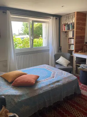 Un ou plusieurs lits dans un hébergement de l'établissement Chambre d'hote Locronan