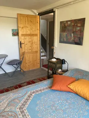 Un ou plusieurs lits dans un hébergement de l'établissement Chambre d'hote Locronan
