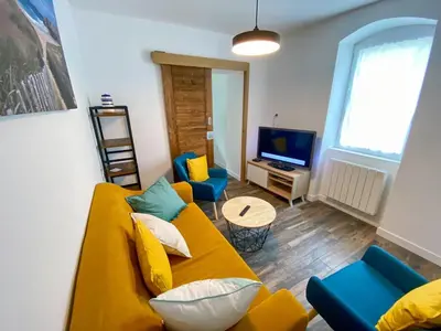 Télévision ou salle de divertissement dans l'établissement Charmante Maison au fil de la Voie Verte