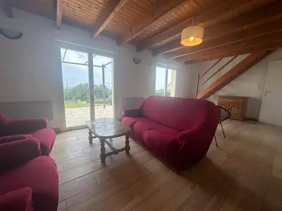 Coin salon dans l'établissement Maison de vacances Crozon 2ch - jardin clos