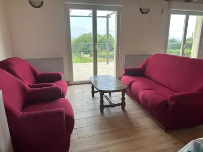 Coin salon dans l'établissement Maison de vacances Crozon 2ch - jardin clos