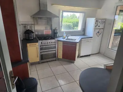 Cuisine ou kitchenette dans l'établissement Maison avec Jardin et Jacuzzi