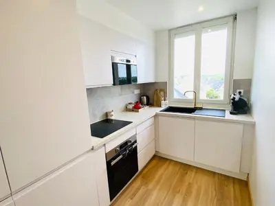 Cuisine ou kitchenette dans l'établissement L appart Quimperois Centre ville