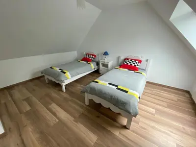 Un ou plusieurs lits dans un hébergement de l'établissement Maison Albert