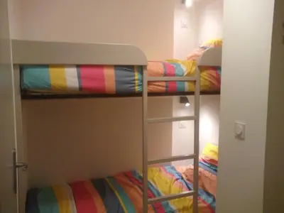 Un ou plusieurs lits dans un hébergement de l'établissement Apartment Brittany facing and seaside