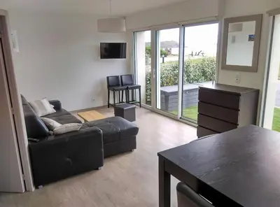 Coin salon dans l'établissement Apartment Brittany facing and seaside