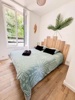 Un ou plusieurs lits dans un hébergement de l'établissement Appartement Quimper Centre ville avec Parking