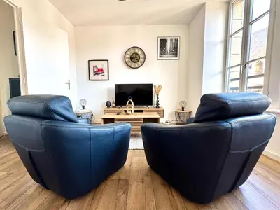 Télévision ou salle de divertissement dans l'établissement Appartement Quimper Centre ville avec Parking