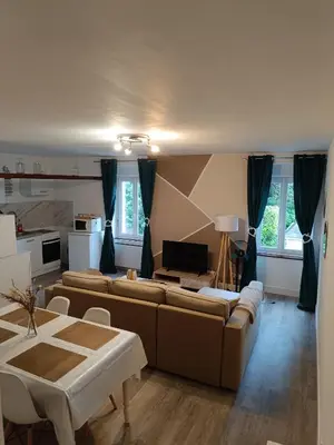 Coin salon dans l'établissement Charmant appartement proche de la ville et du bord de Mer