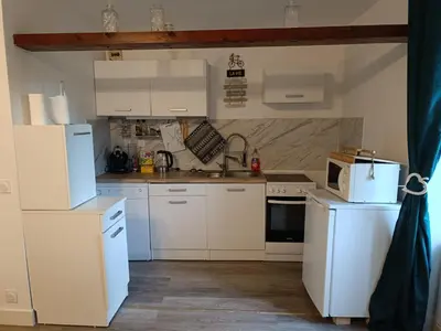 Cuisine ou kitchenette dans l'établissement Charmant appartement proche de la ville et du bord de Mer
