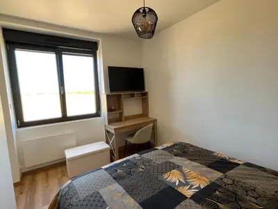 Un ou plusieurs lits dans un hébergement de l'établissement Appartement à 10 minutes à pied de la mer