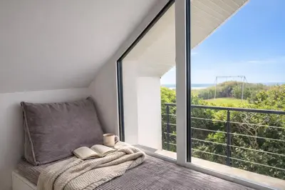 Un ou plusieurs lits dans un hébergement de l'établissement Tipoz'Immo - Brise Marine 1 accès direct plage - vue mer - spot de surf - wifi inclus - linge inclus et lits faits - balcon - parking gratuit - proches des commerces