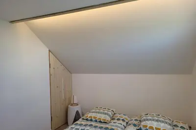 Un ou plusieurs lits dans un hébergement de l'établissement Tipoz'Immo - Brise Marine 1 accès direct plage - vue mer - spot de surf - wifi inclus - linge inclus et lits faits - balcon - parking gratuit - proches des commerces