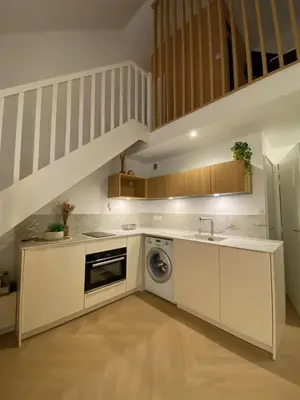 Cuisine ou kitchenette dans l'établissement Appartement pieds dans l eau vue mer