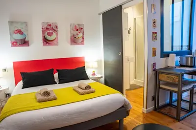 Un ou plusieurs lits dans un hébergement de l'établissement DORMIR EN VILLE - À 450 m du centre historique