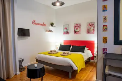 Un ou plusieurs lits dans un hébergement de l'établissement DORMIR EN VILLE - À 450 m du centre historique