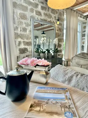 Un ou plusieurs lits dans un hébergement de l'établissement Maison Tarte au Miel Atelier Penmarch