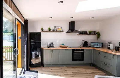 Cuisine ou kitchenette dans l'établissement Appartement lumineux à 600m de la plage