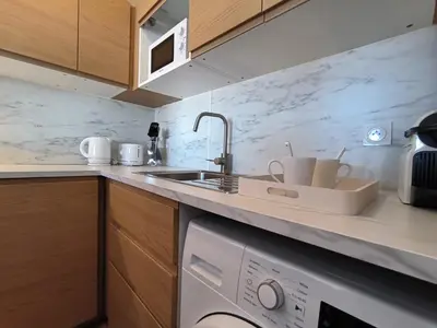 Cuisine ou kitchenette dans l'établissement Les voiliers