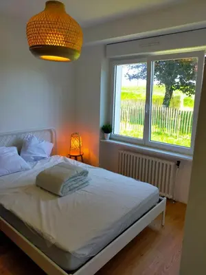 Un ou plusieurs lits dans un hébergement de l'établissement La Maison des Champs et des Vagues