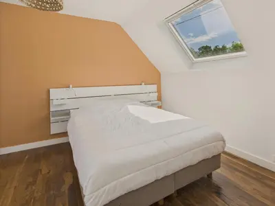 Un ou plusieurs lits dans un hébergement de l'établissement Grand jardin et terrasse - 4 adultes et 1 enfant