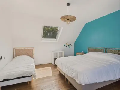 Un ou plusieurs lits dans un hébergement de l'établissement Grand jardin et terrasse - 4 adultes et 1 enfant