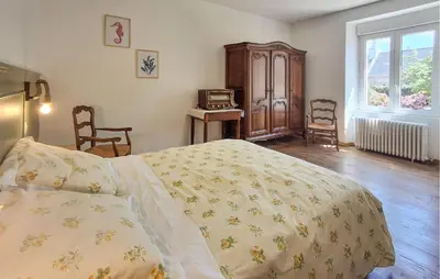Un ou plusieurs lits dans un hébergement de l'établissement 3 Bedroom Amazing Home In Plouhinec