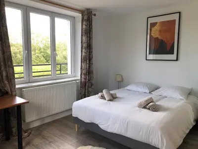 Un ou plusieurs lits dans un hébergement de l'établissement Family home