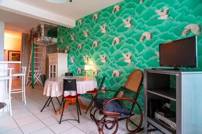 Télévision ou salle de divertissement dans l'établissement Le Nid du Trez - Plage à 150 m