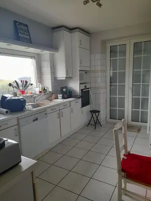 Cuisine ou kitchenette dans l'établissement Maison familiale, front mer