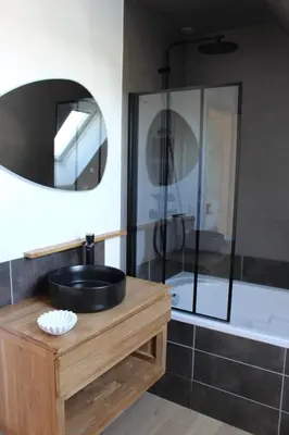 Salle de bains dans l'établissement L'Abri de la plage